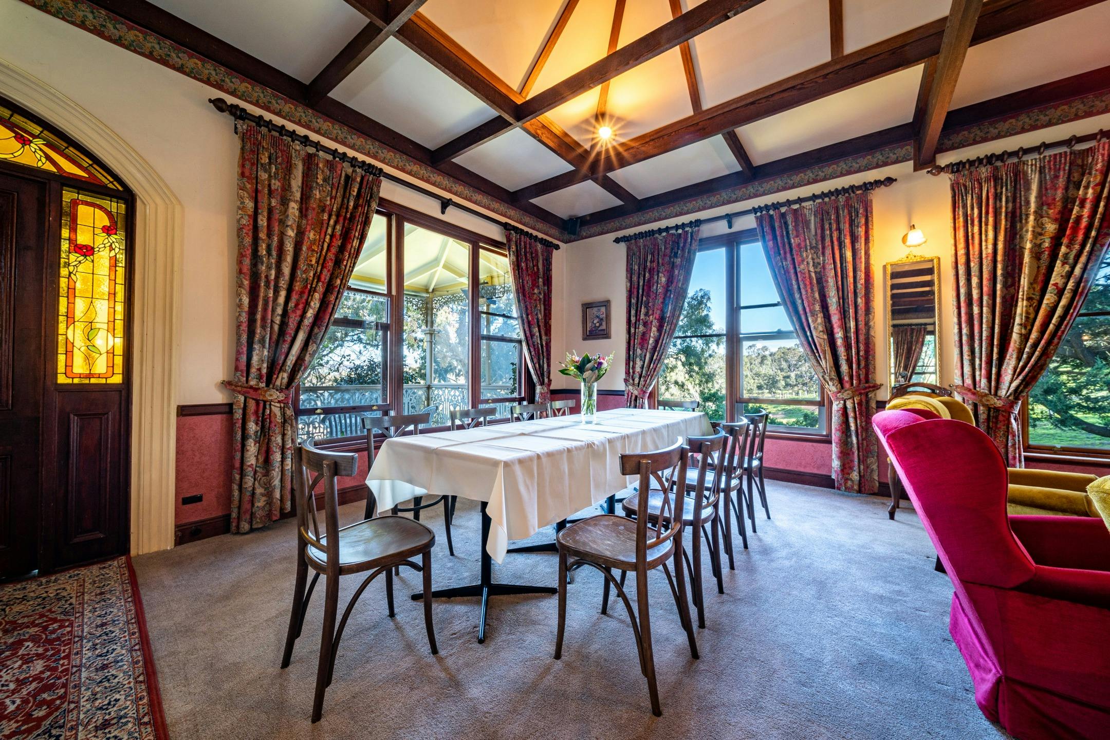 Dining area with Adelaide Hills views from the picture windows.