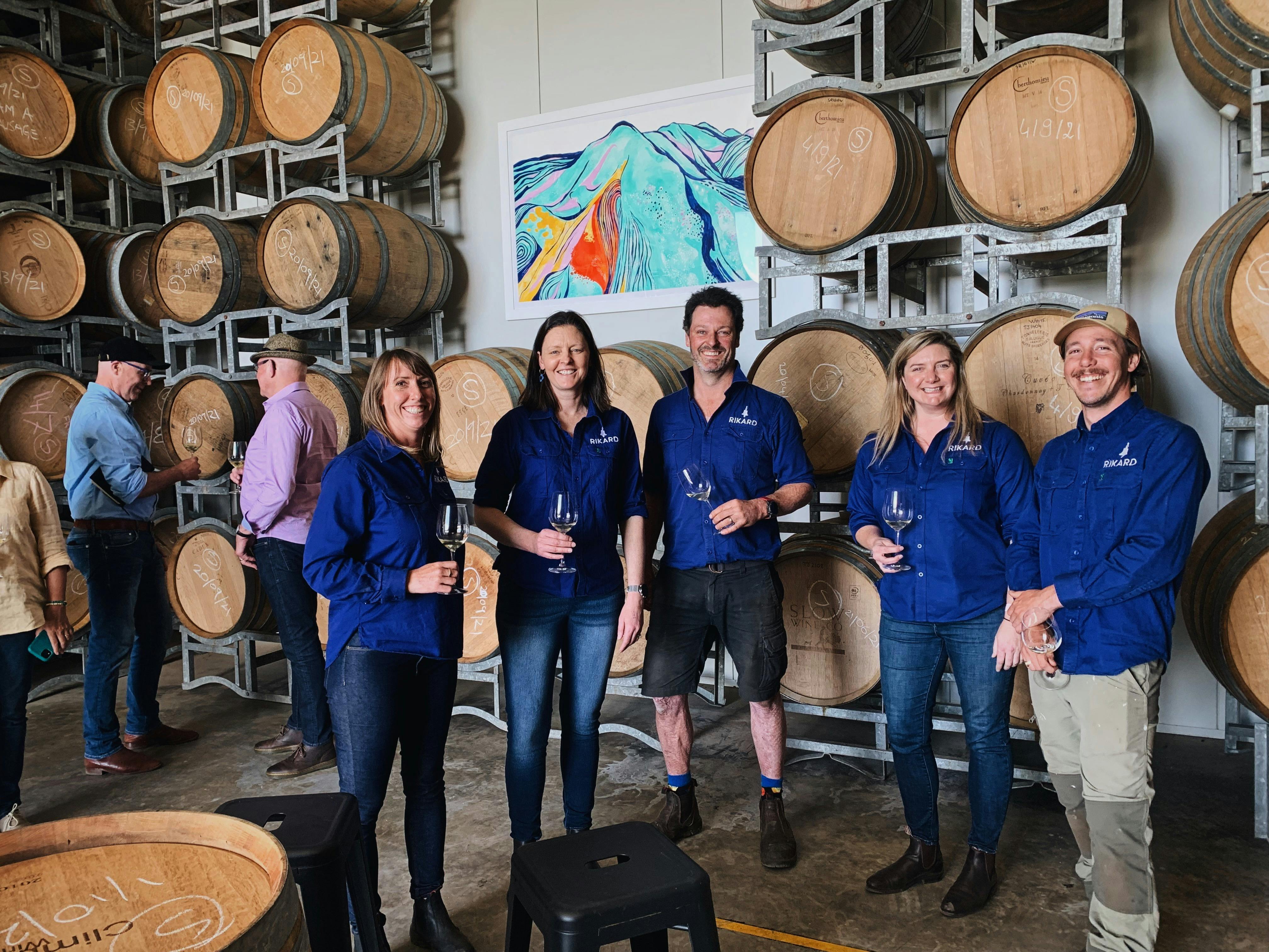 RIKARD winery and team in barrel room