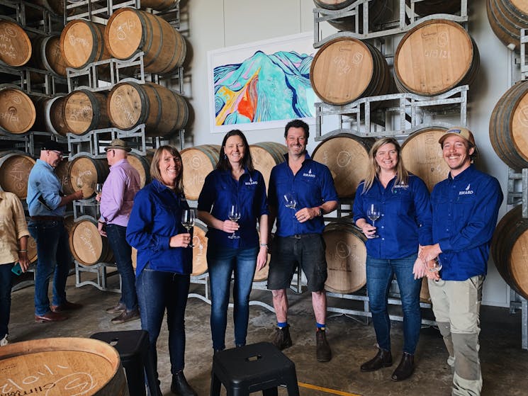 RIKARD winery and team in barrel room