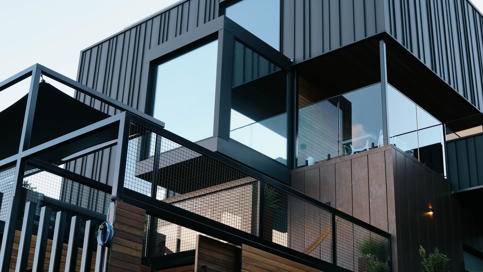 Architectural exterior of Boxwood Villa, designed from shipping containers with modern, bold lines.