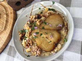 An unctuous Risotto made with Grilled Pear, Creamy Blue Cheese and Toasted Walnuts.