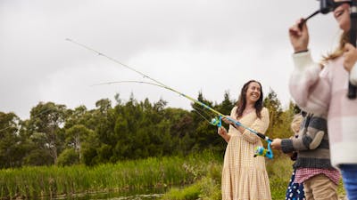 Female with fishing rod at Pejar Dam