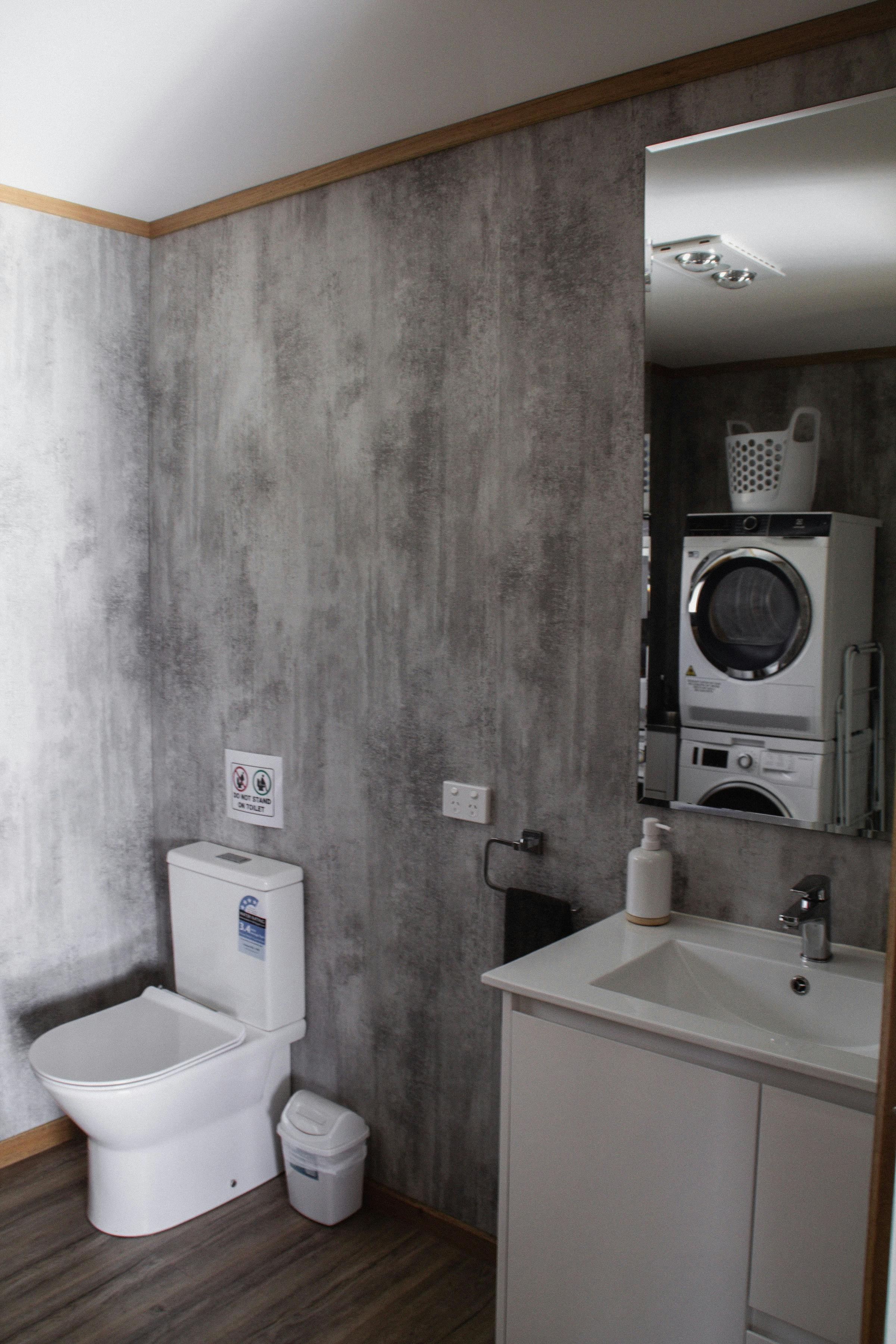 Bathroom with washer and dryer