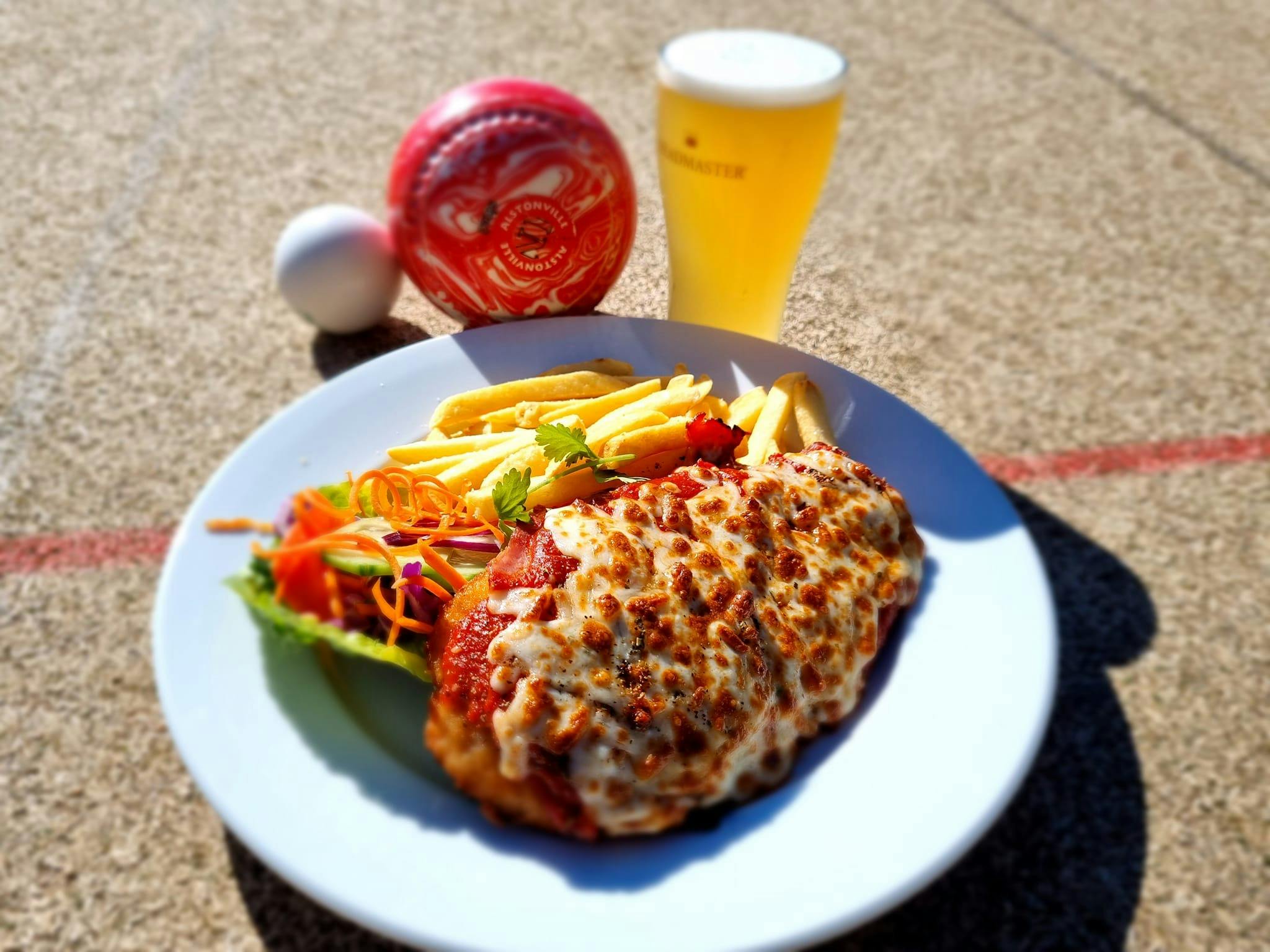 Pub meal with beer and bowls balls