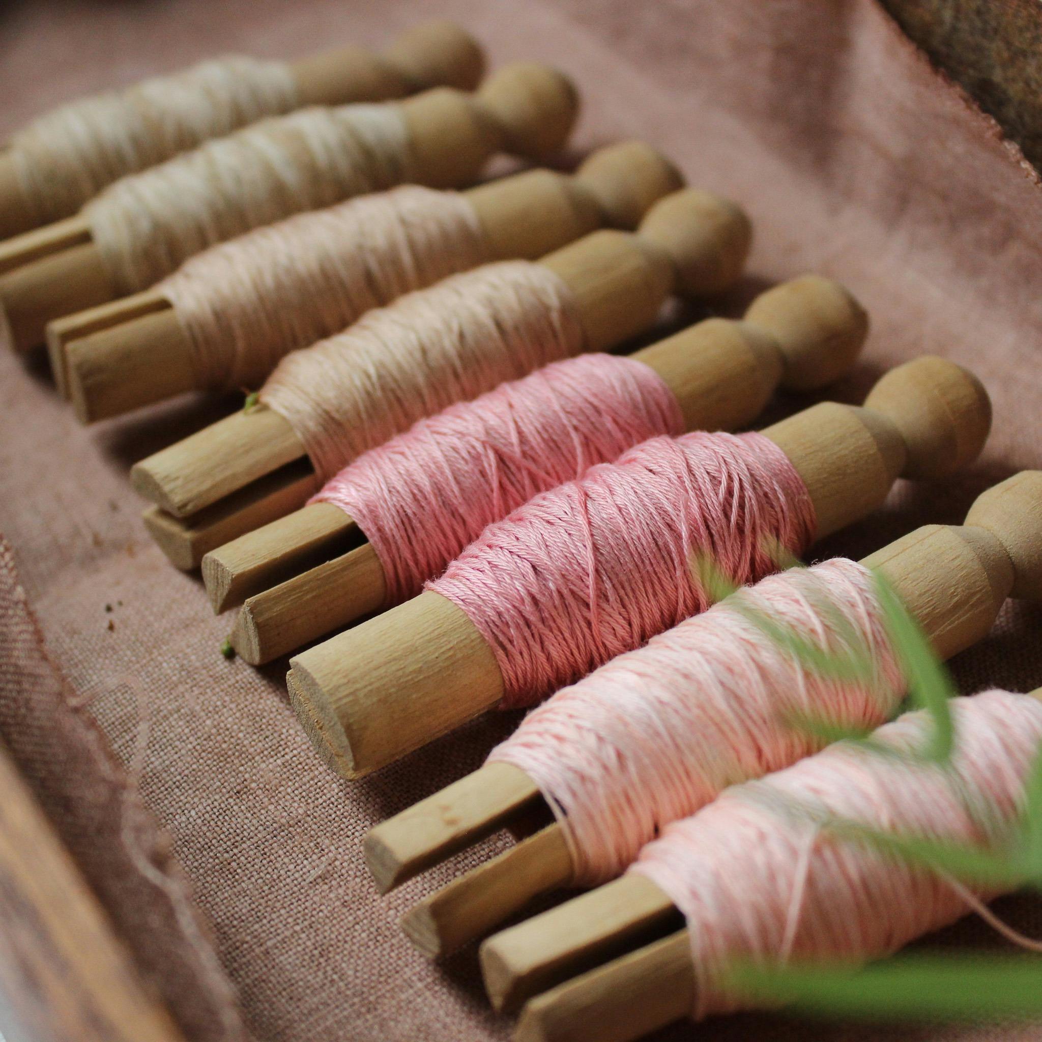 Rustic bobbins of botanical dye sashiko thread locally dyed by hand