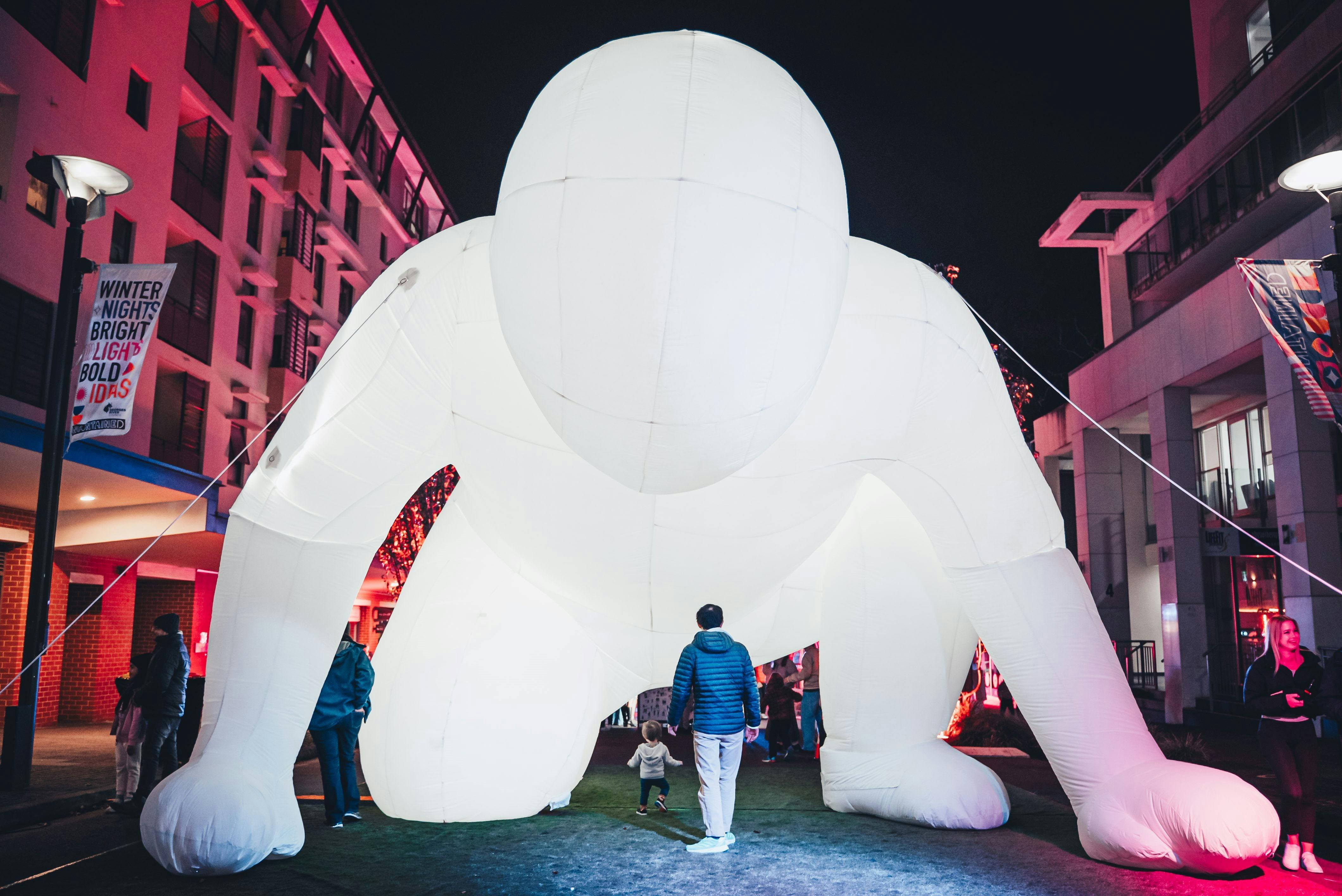 Giant man art installation at Uncontained