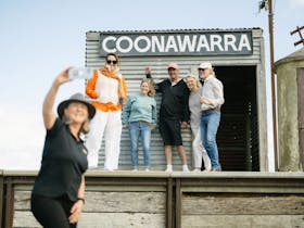 Tour guide taking a selfie with tour group at the Coonawarra Railway siding