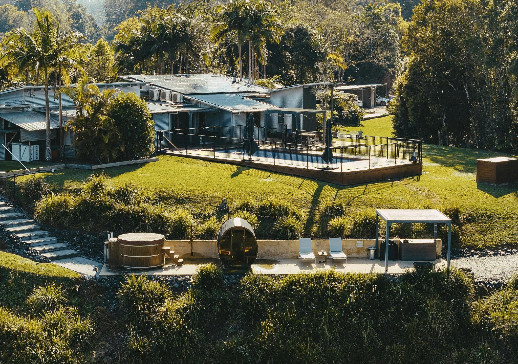 Drone View of the Viewing Deck, Cedar Sauna & Cold Plunge with Outdoor Fireplace & BBQ Area
