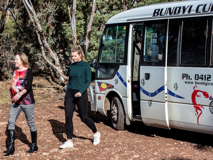 Women disembarking the Bundyi Aboriginal Cultural Tours bus in Wagga Wagga