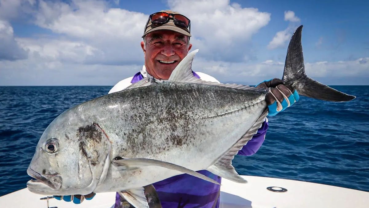 guest holding fish guest holding fish