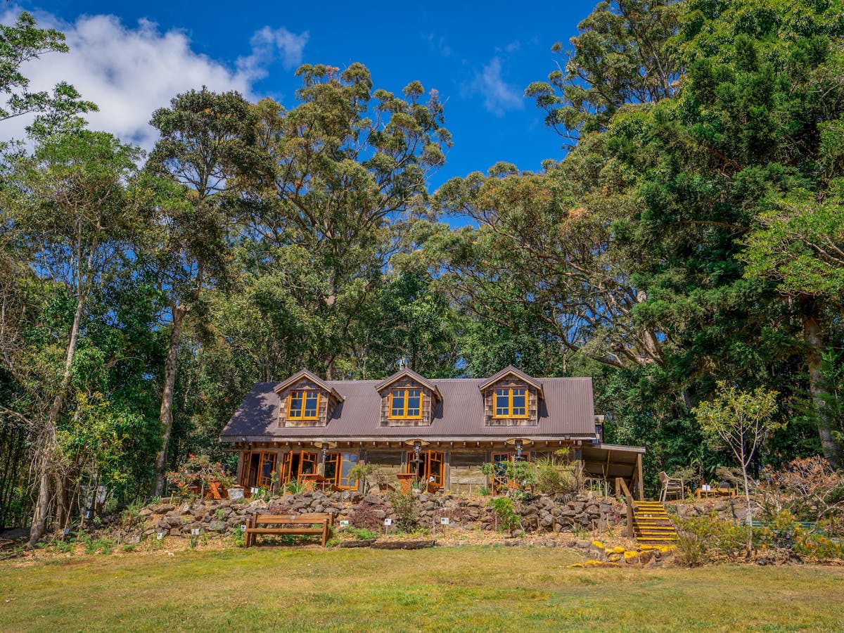 Historic cottage with three windows in gabled roof