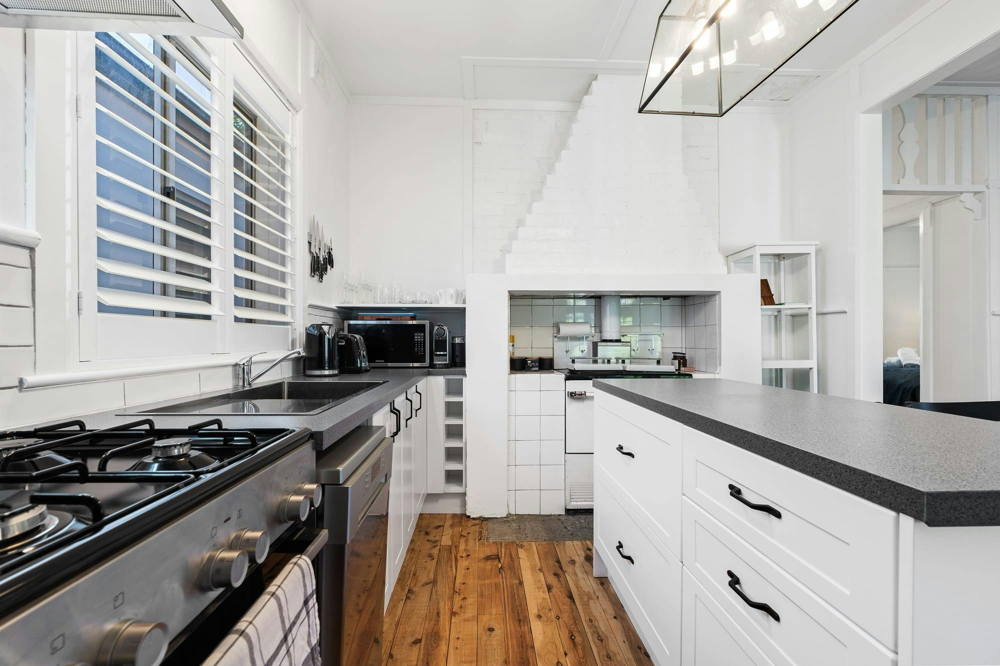 Large clean kitchen with amenities and appliances