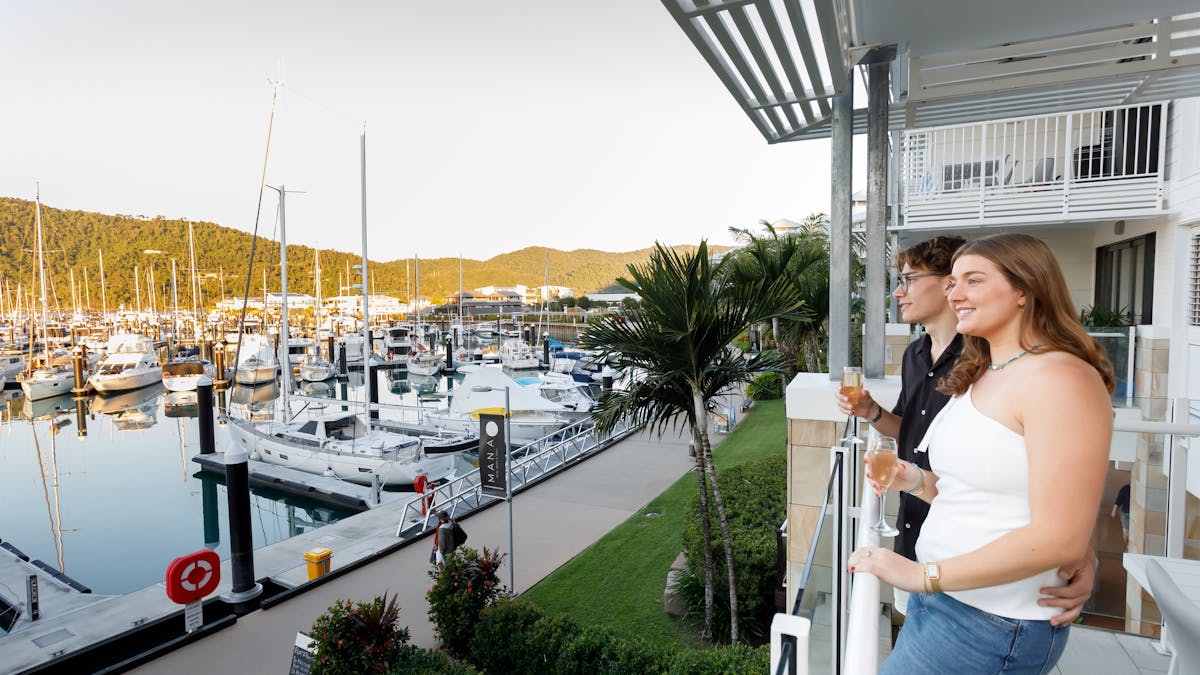 The Boathouse Apartments in The Whitsundays  Guests enjoying the marina views from the master suite