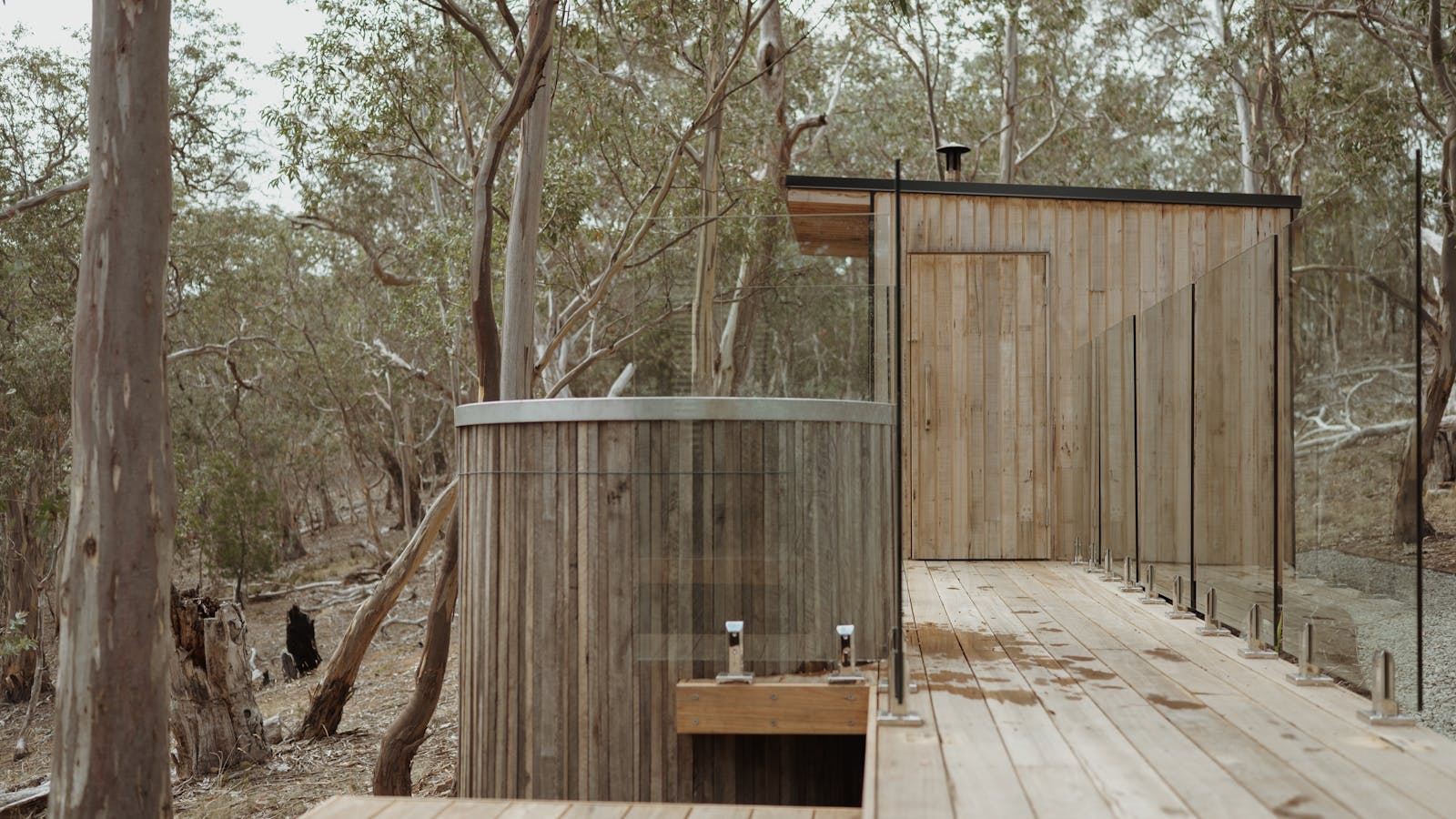 Woodfired sauna and cold plunge set amongst Tasmanian bush