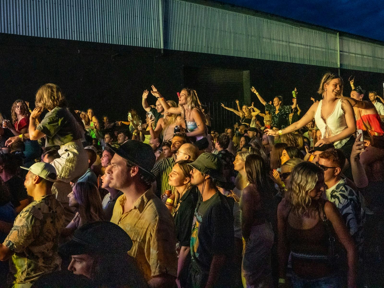 A large crowd at Carrodise 2023 enjoys the evening sets