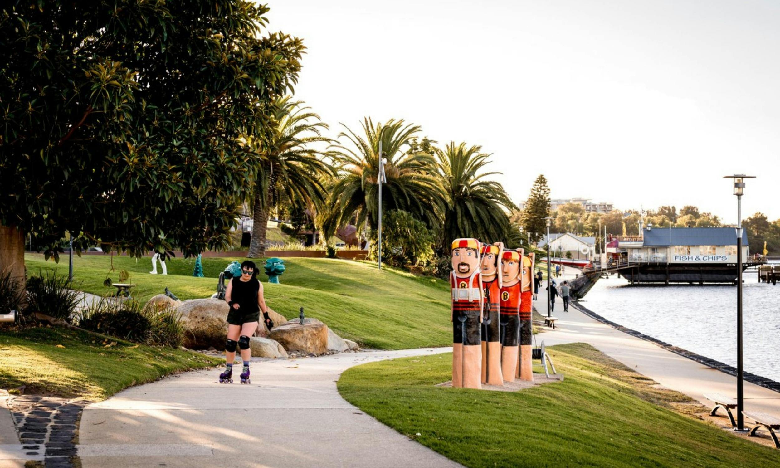 Skating past the Geelong waterfront bollards