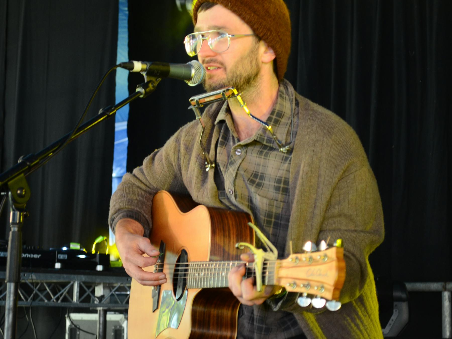 Local artist Benny Williams playing acoustic guitar