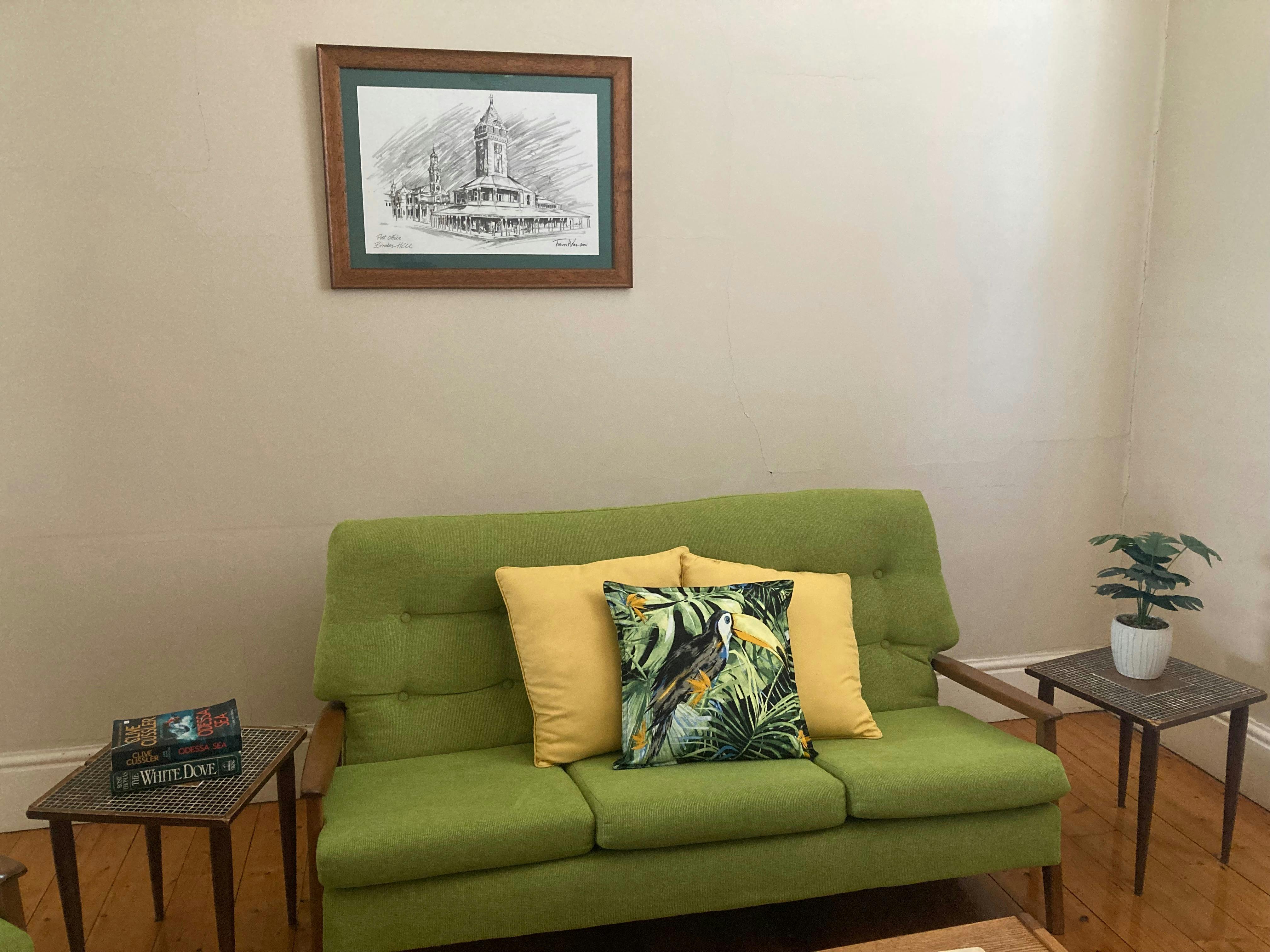 Newly upholstered lounge with bright cushions