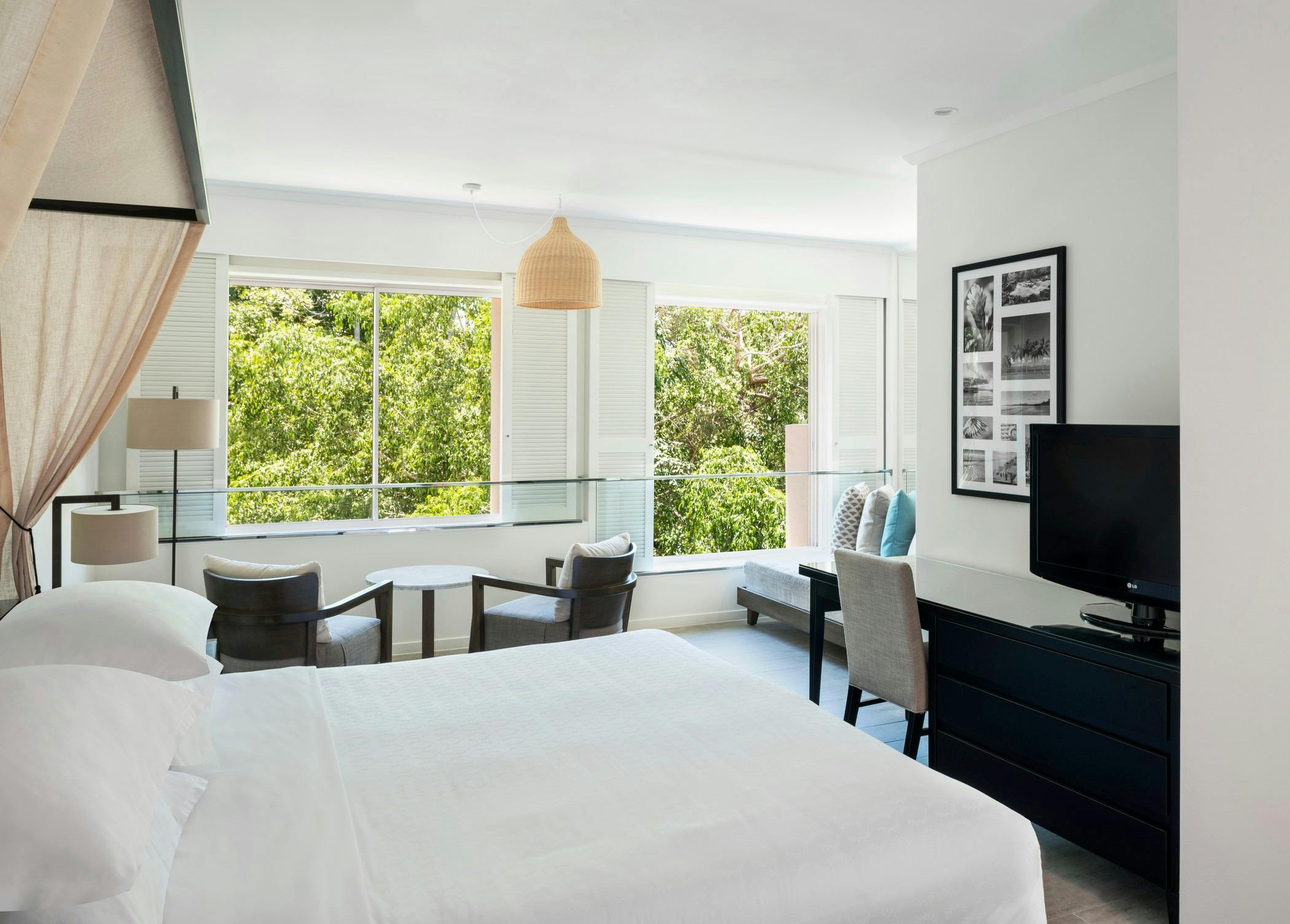 King Bed overlooking tropical garden