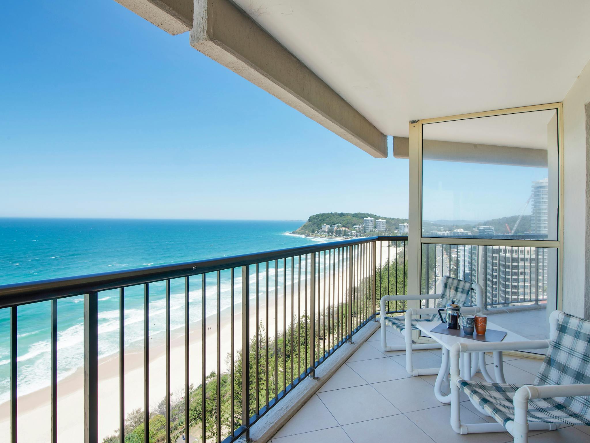 Stunning Ocean Views from the private balcony with chairs and table Stunning Ocean Views from the private balcony with chairs and table