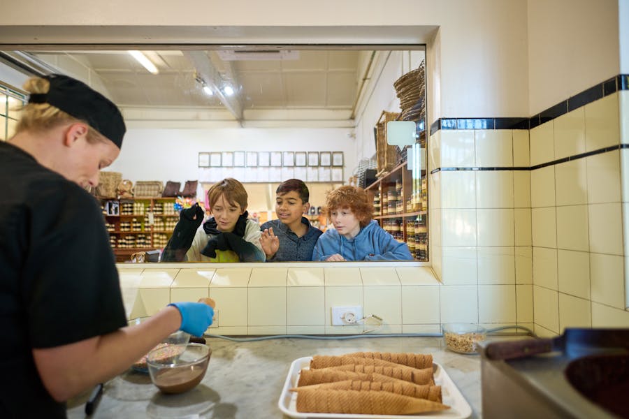 Children watching chocolatier working at The Treat Factory