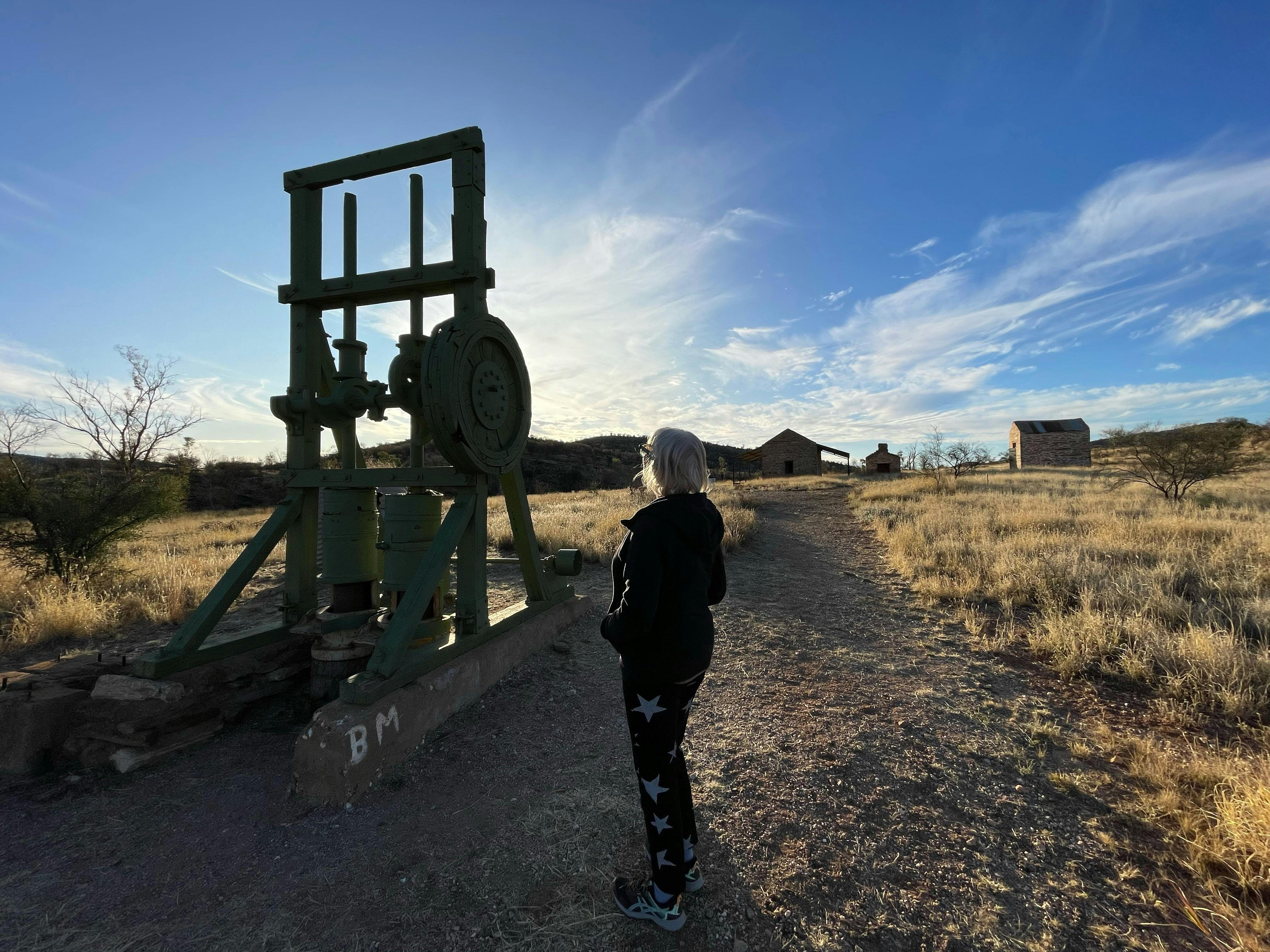 Looking at historic mining equipment at Arltunga