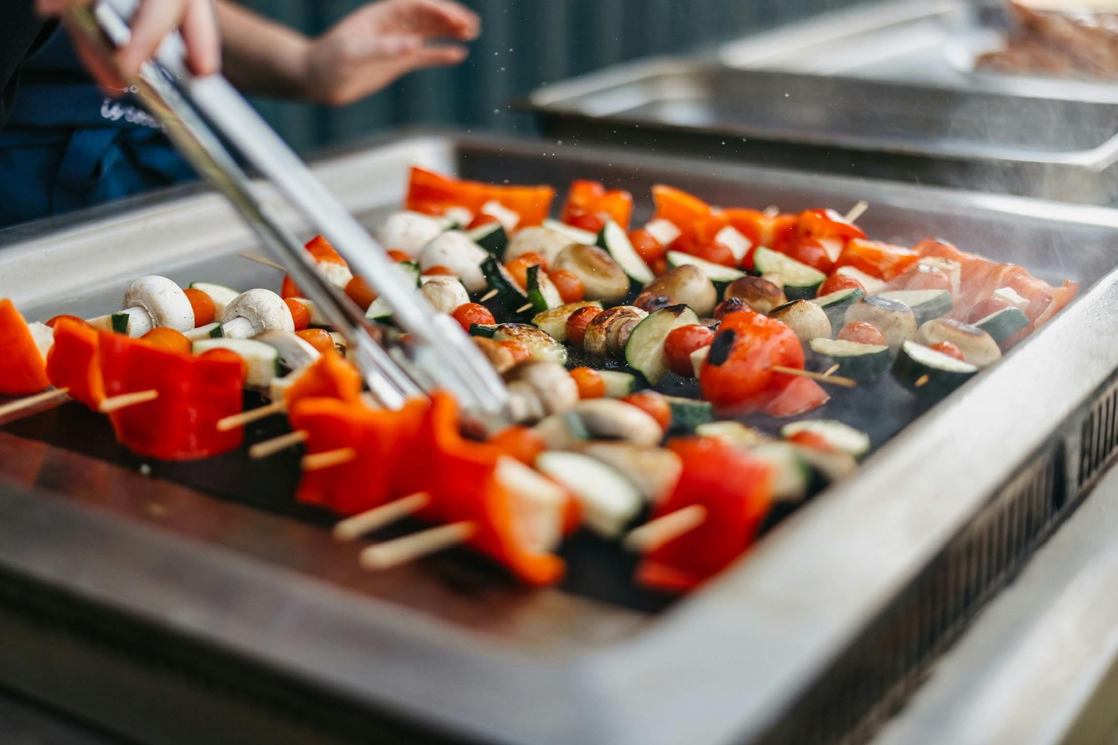 BBQ Kebabs being prepared for guests as part of the tapas meal at our absolute beachside venue