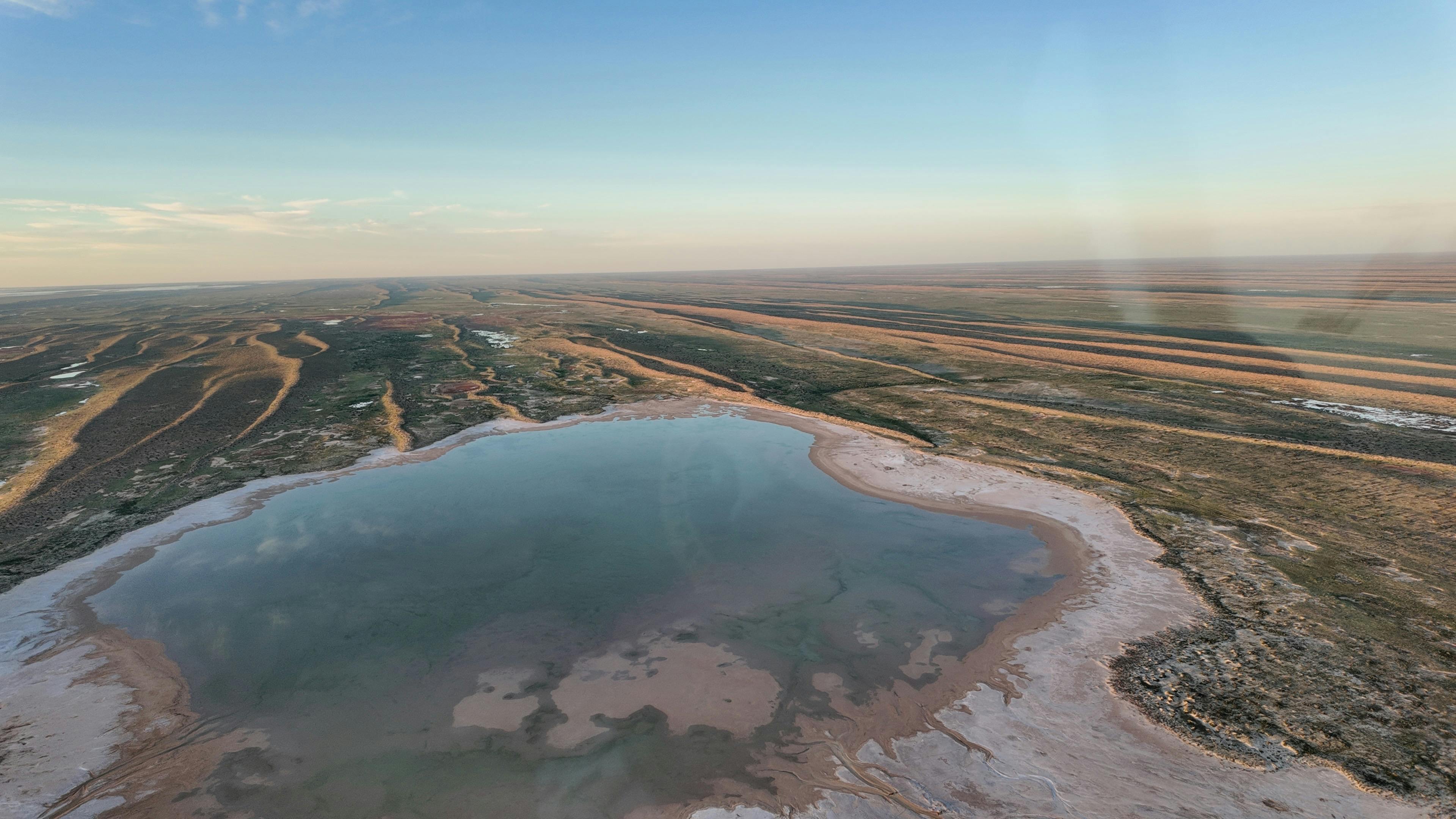 Aerial view of a remote salt lake and surrounding Channel Country landscape near Kati Thandau2013Lake Ey