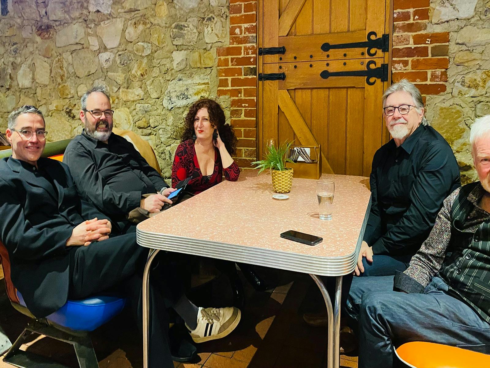 around retro tables sitting Richard, Pete Bonnie Steve and Quinton