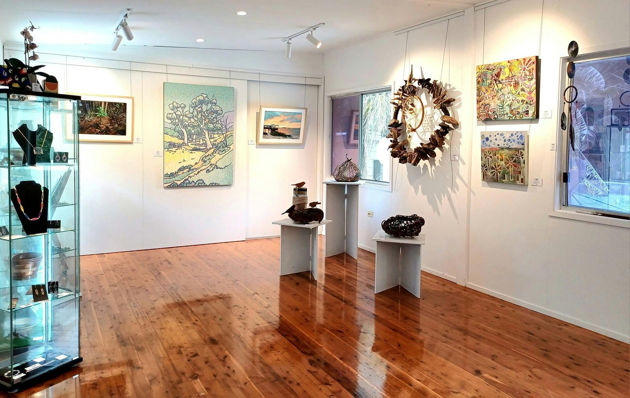 Photo shows acrylic paintings; Woven Hangings Jewellery and wood work - all by local artists