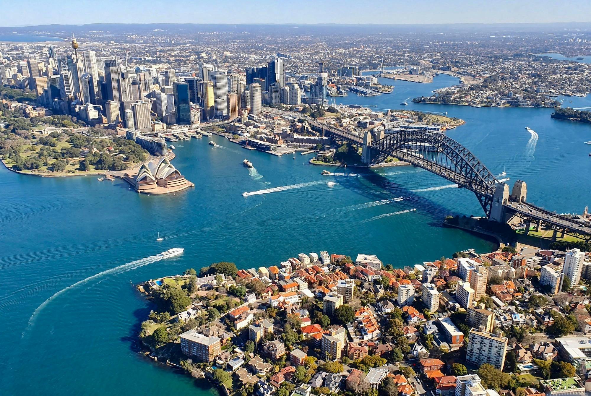 Aerial view of Sydney Harbour looking back towards Sydney Opera House, Sydney Harbour Bridge & city