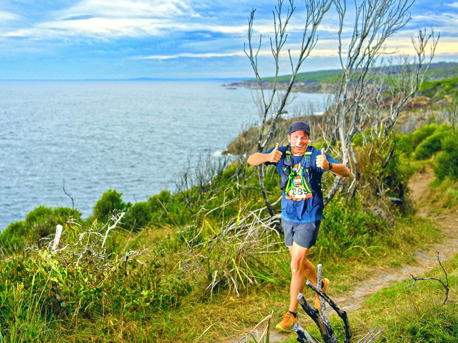 Runner on the cliff top