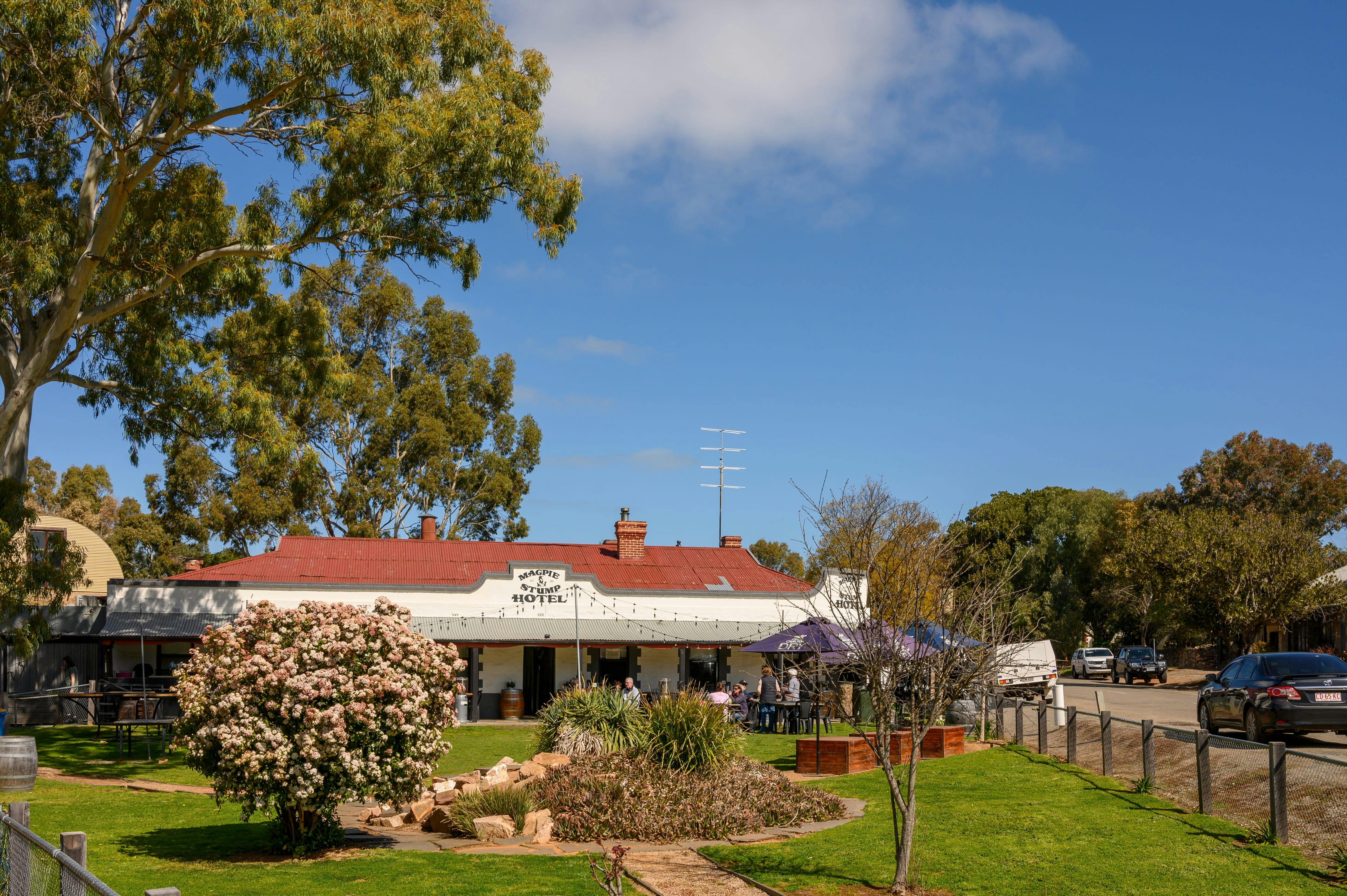 View of country pub with gardens in foreground