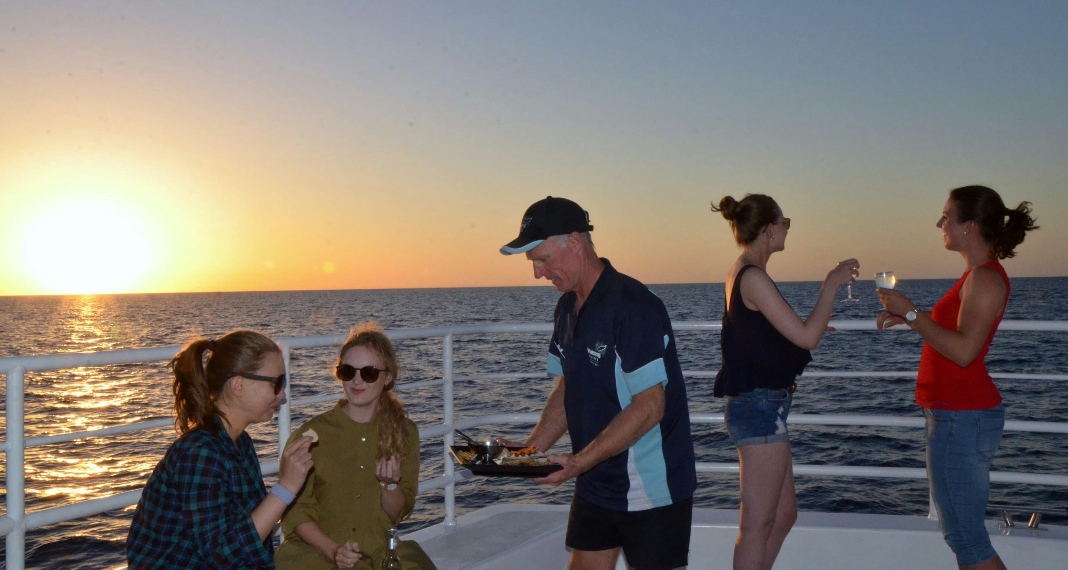Sunset service on board Whalesong Cruises