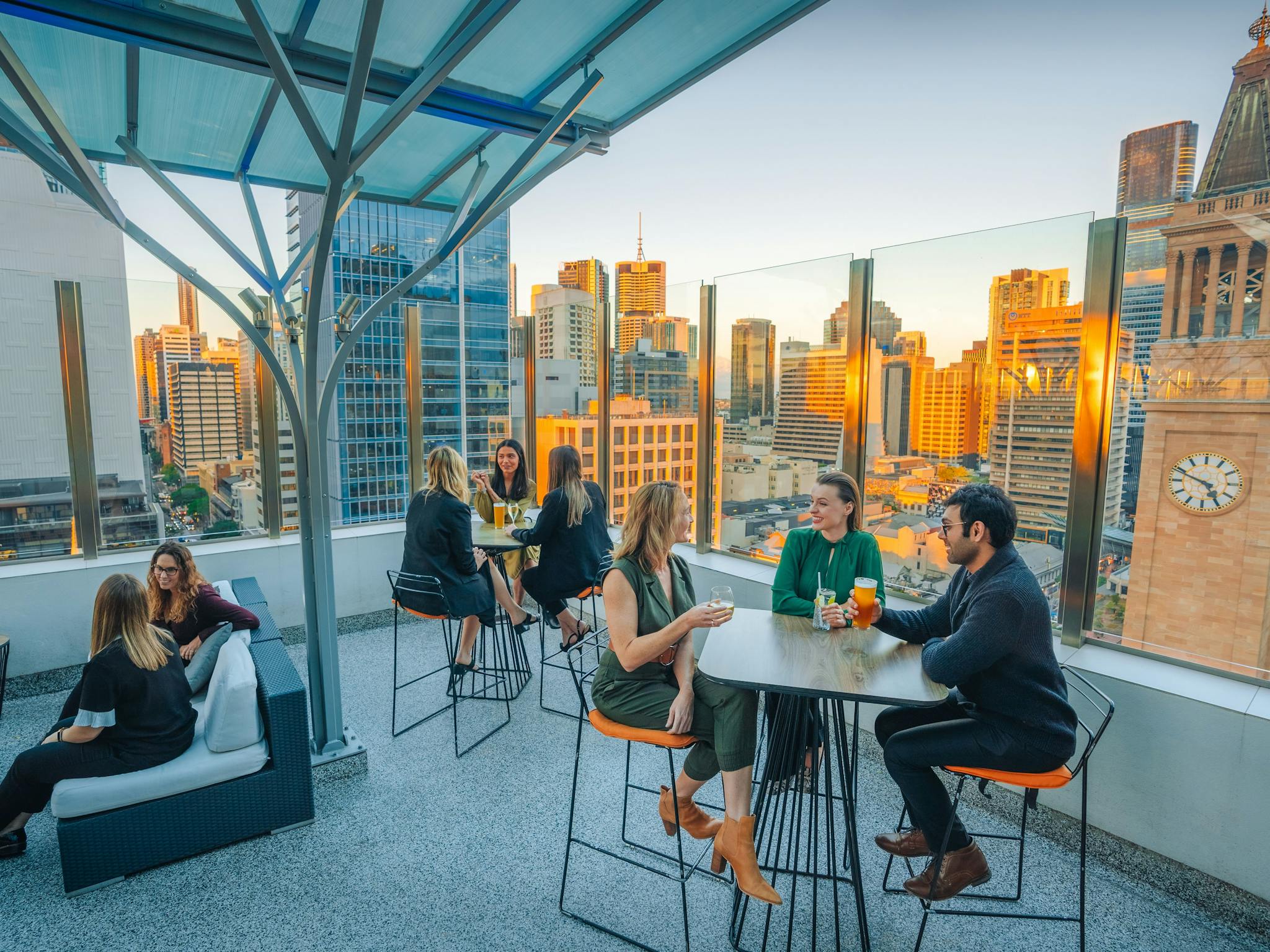 Sixteen Antlers Rooftop Bar, cocktails and sunset overlooking the city skyline Sixteen Antlers Rooftop Bar, cocktails and sunset overlooking the city skyline