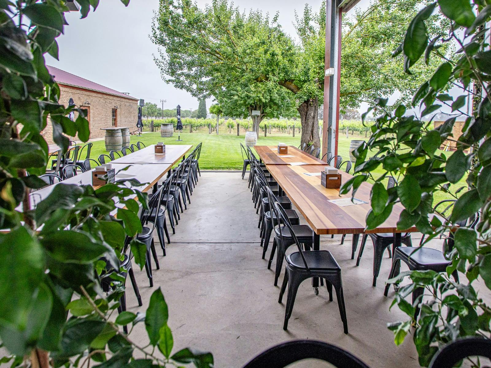 looking out onto the lawn area with tables and chairs
