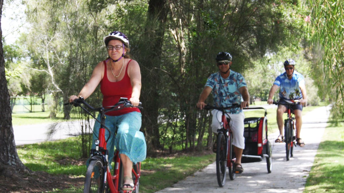Grandparents riding with princess trailer