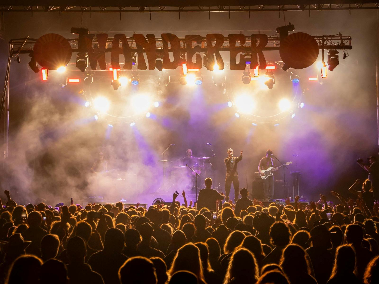 A band perform to a crowd