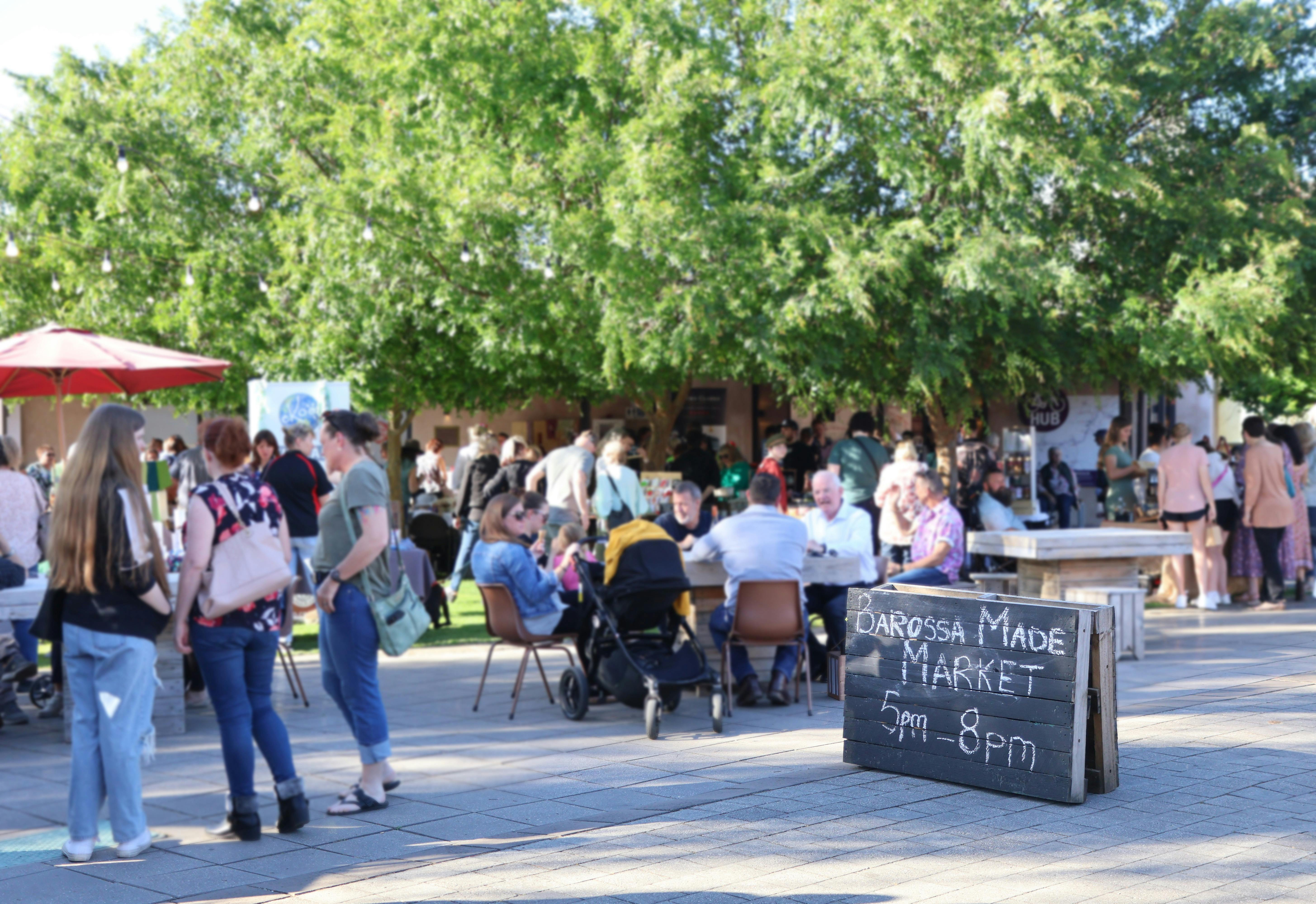 Landscape photograph of people enjoying the Barossa Made Market seating area