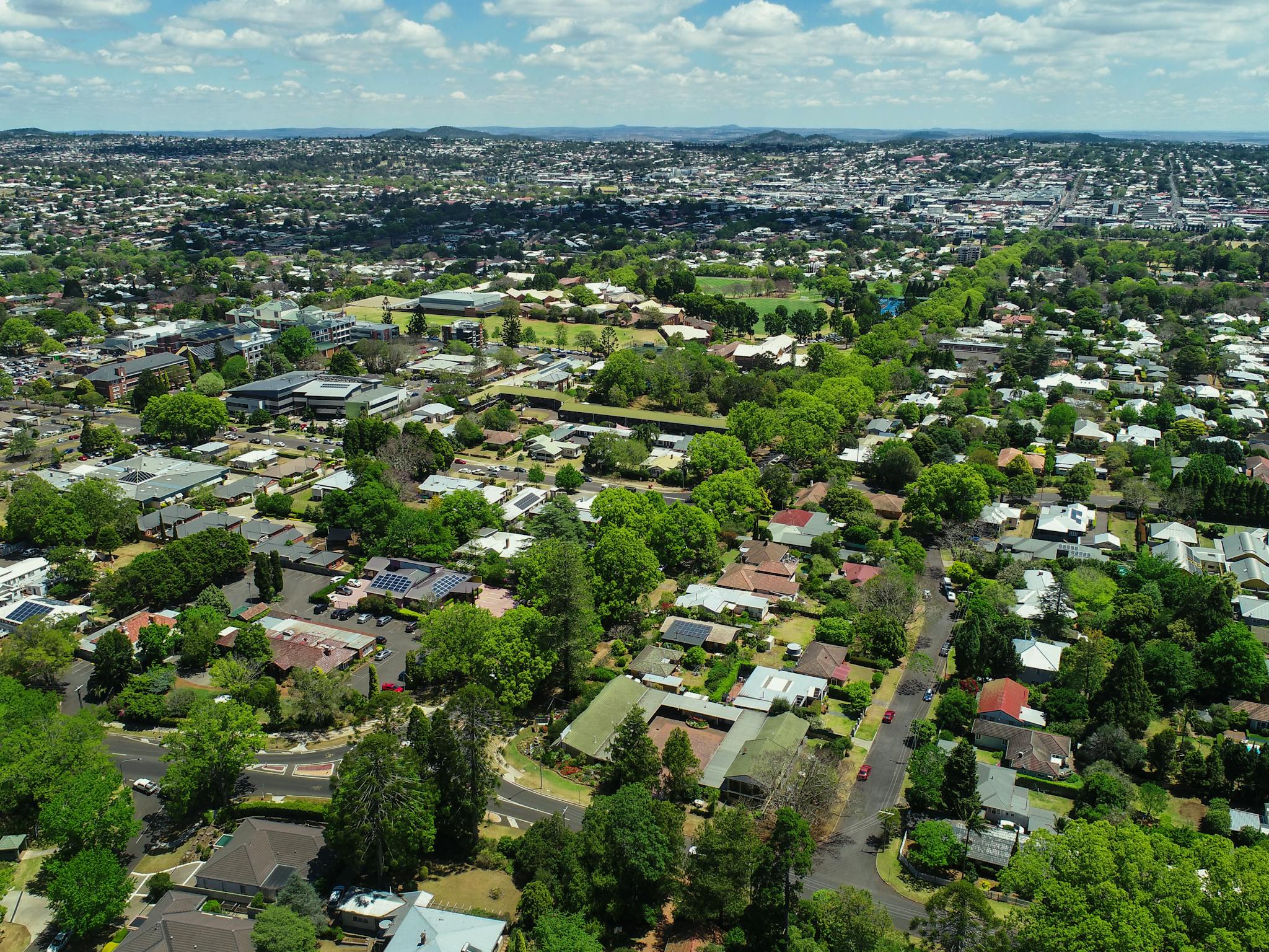 Aerial view of Motel looking East to St Vincent's Hospital, Toowoomba Grammar School & CBD