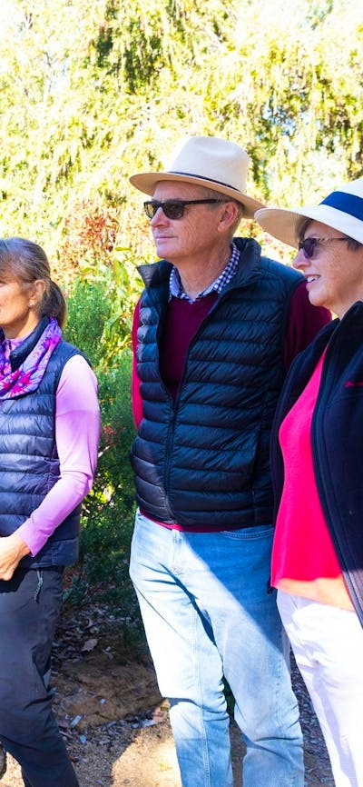 A volunteer guides leads a free guided walk