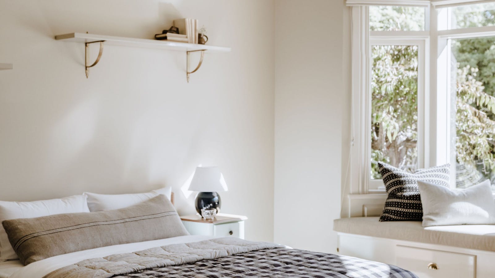 Second bedroom and a glimpse of the garden view
