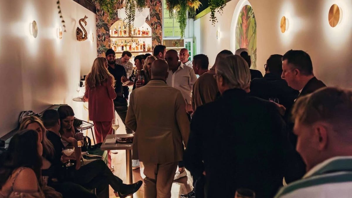 A lively room of people at Nok Nok enjoying their night out