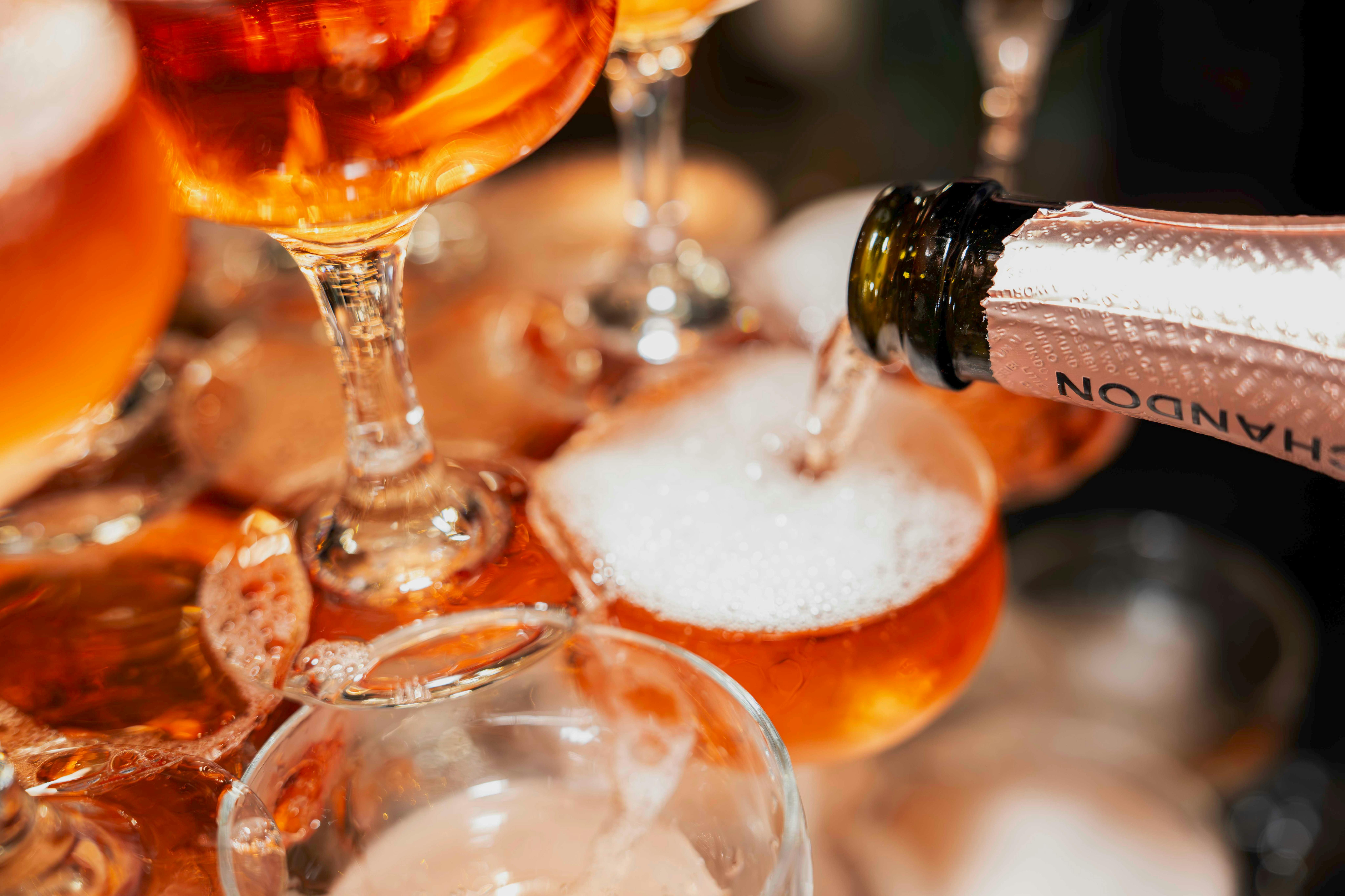 A glass is filled with Chandon