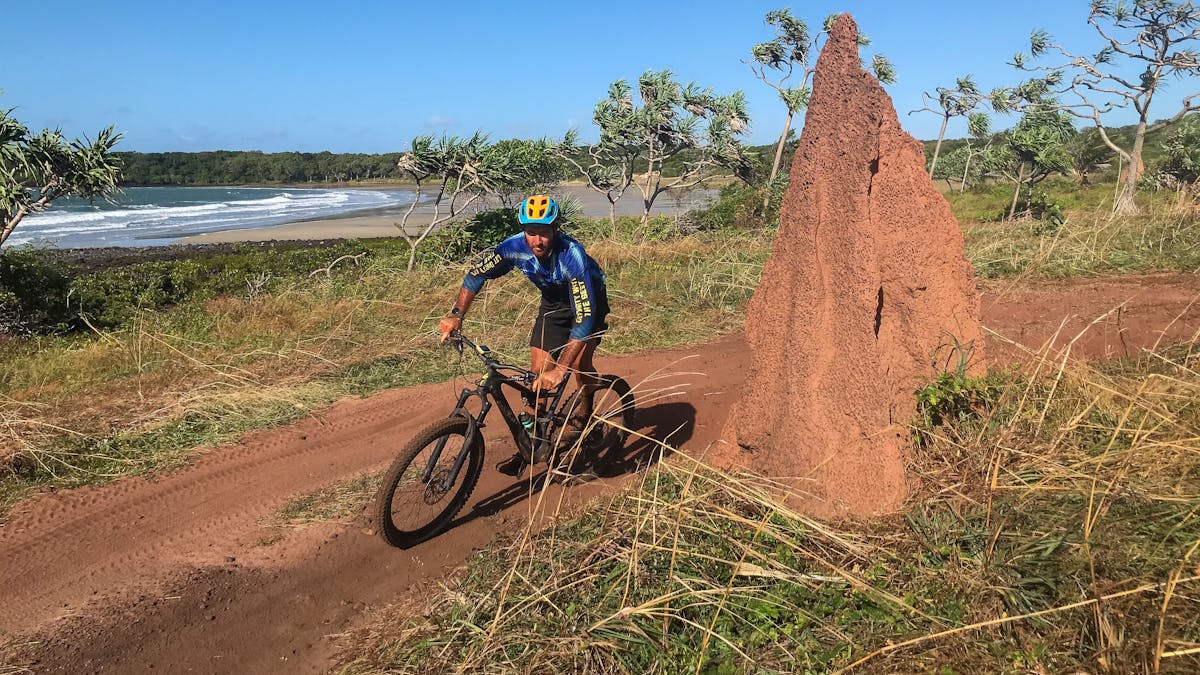 Rider rounding a point on the 5 Beaches track