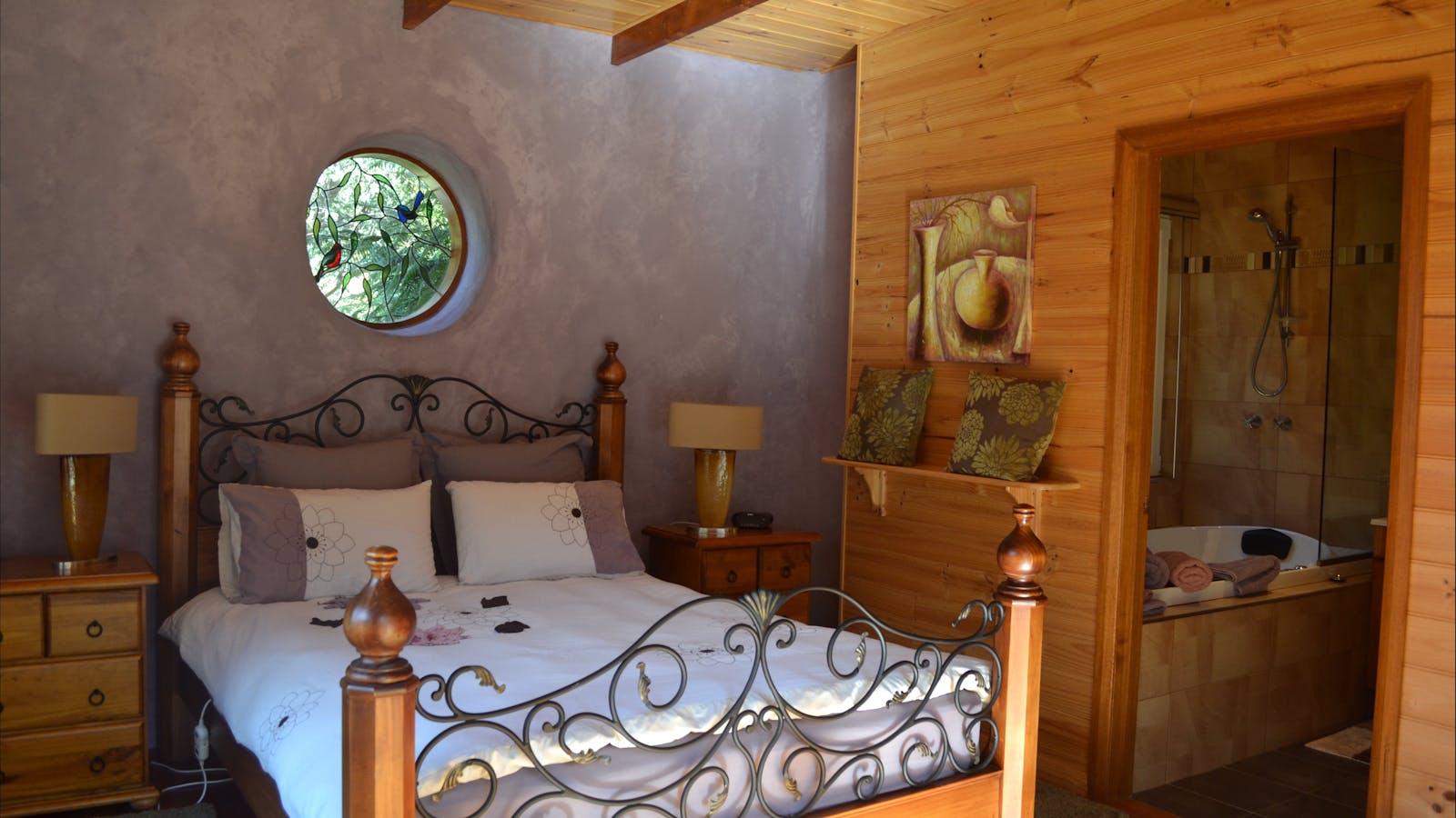 Strawbale Cottage master bedroom and spa
