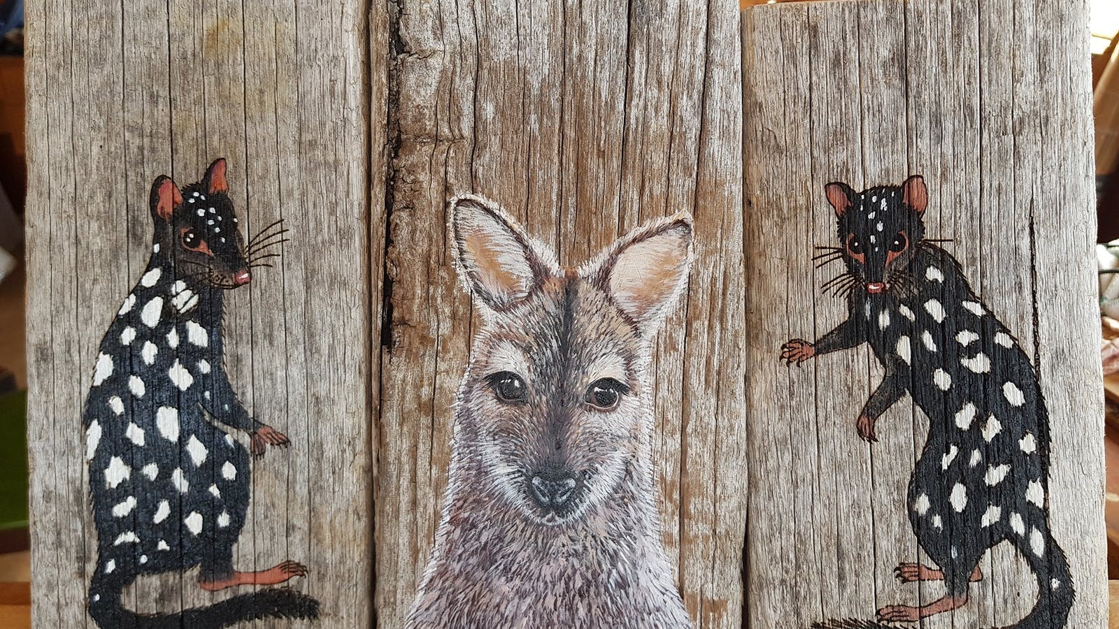 Paintings on wood by Kerry Marvell. Eastern Quolls and Bennetts Wallaby