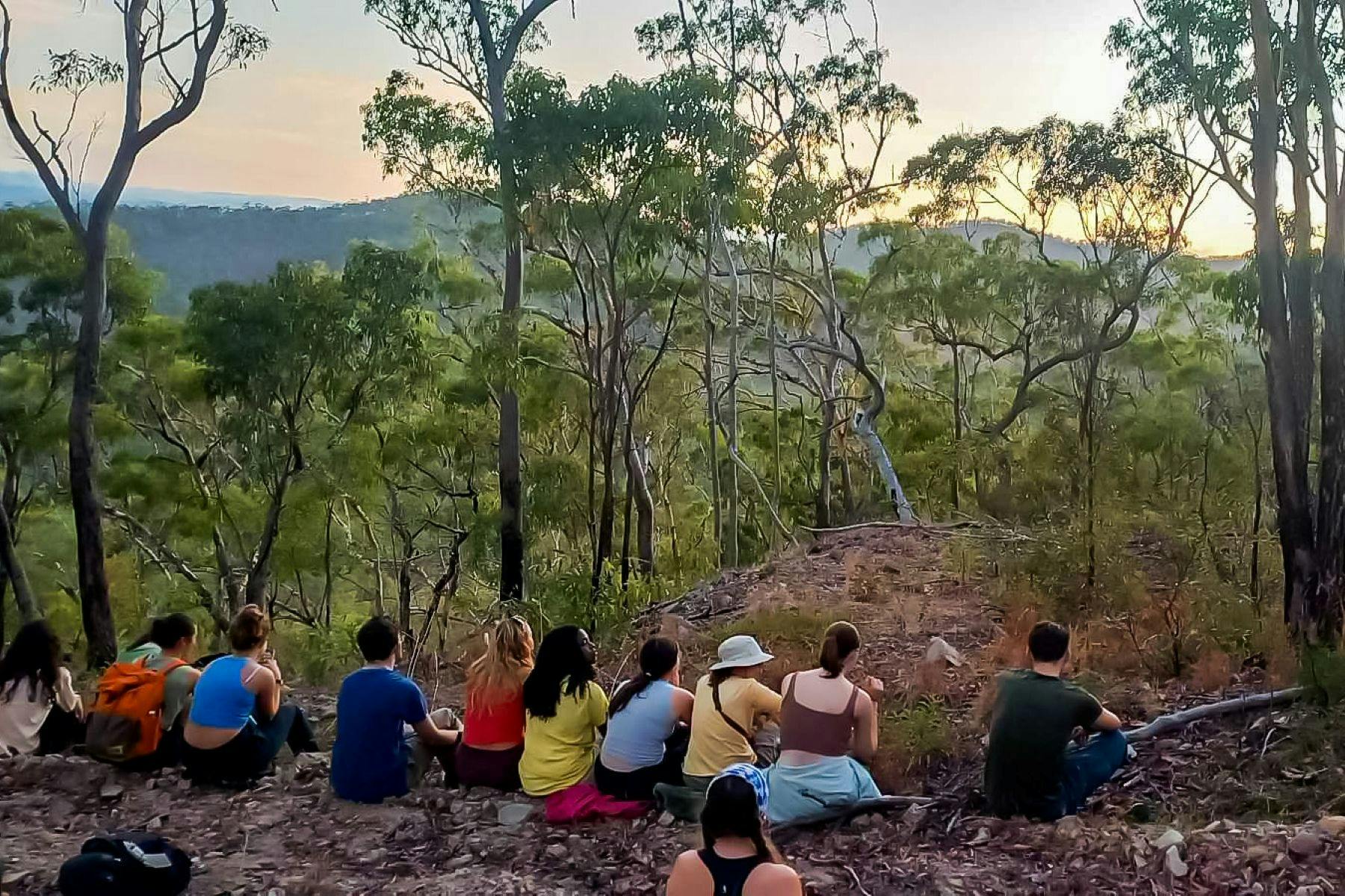 Students on country at sunset