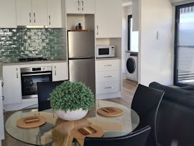 Apartment - Open Plan Kitchen, Dining and Lounge room including  Laundry