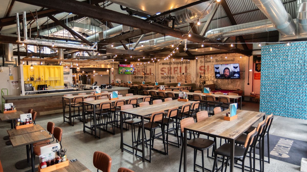 Beer Hall (bottom floor) seating and bar with pool table